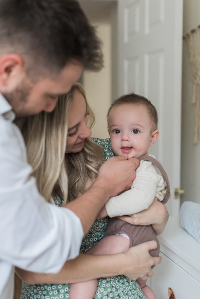 Dad playing with baby