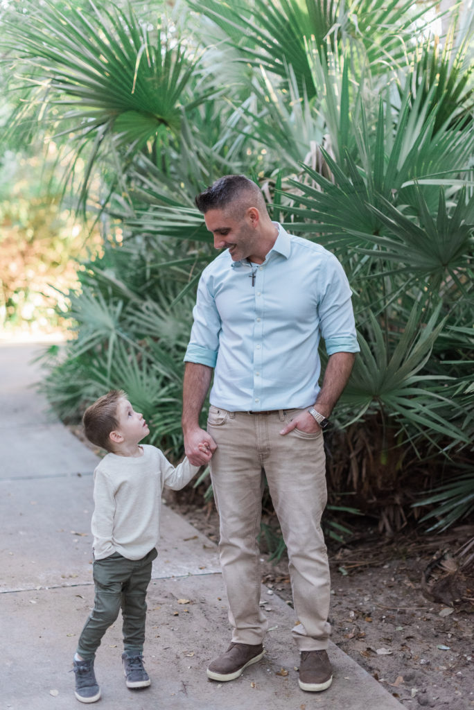 Dad and son looking at each other