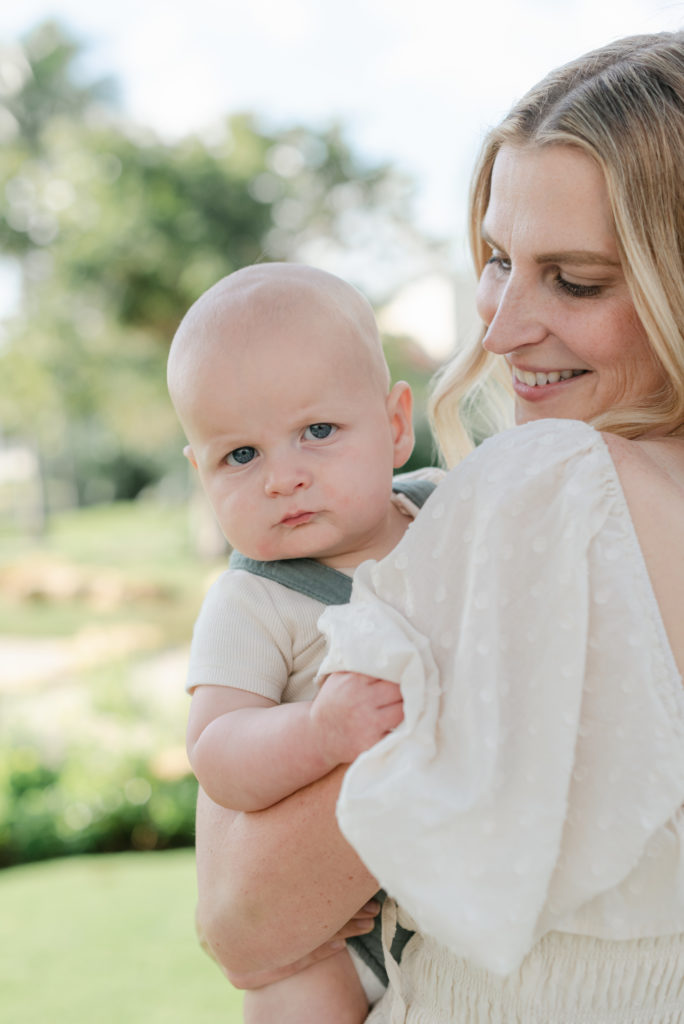 Mom looking over the shoulder at baby