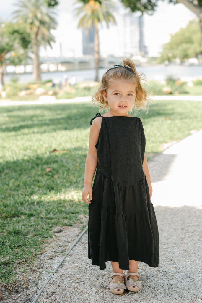 Little girl smiling at the camera