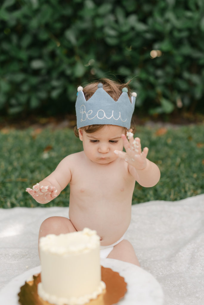 Baby boy wearing a custom name crown