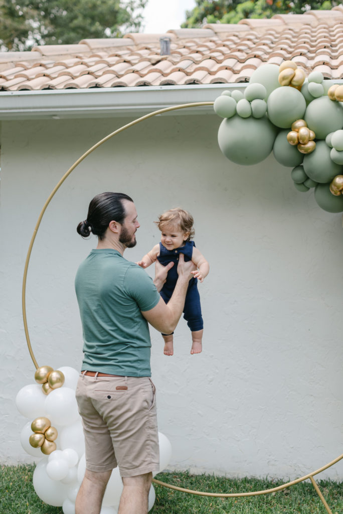 Dad holding baby