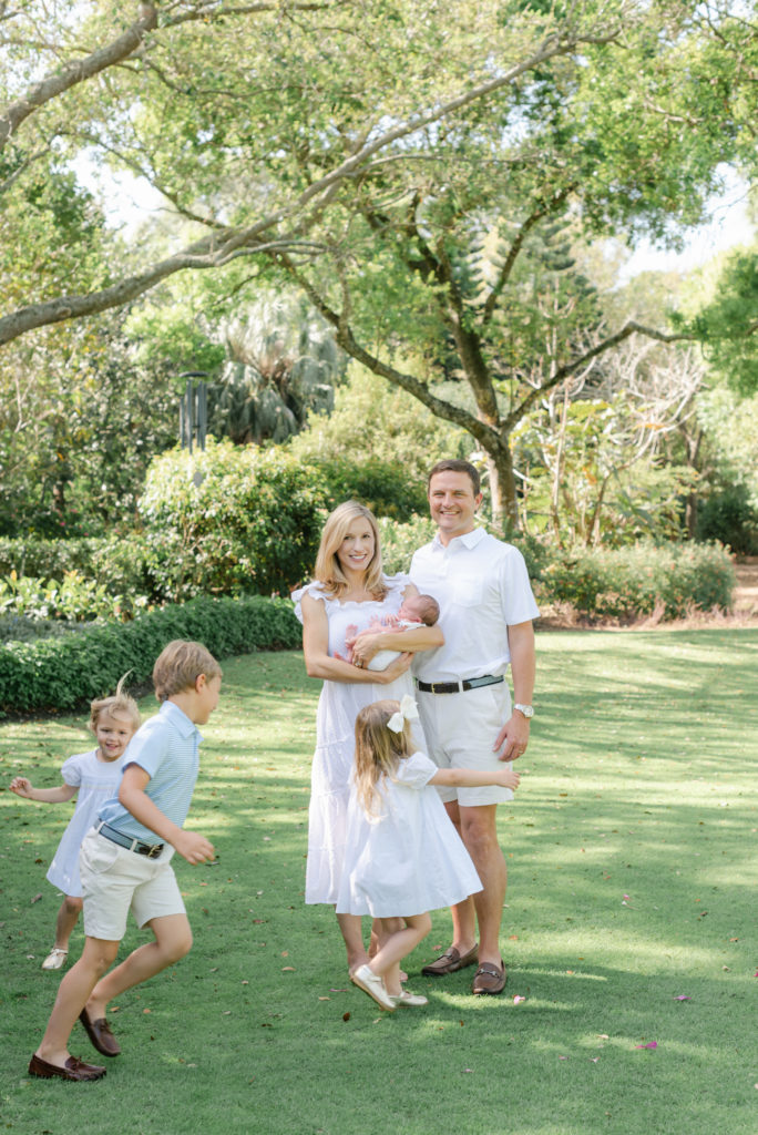 Kids running around mom and dad