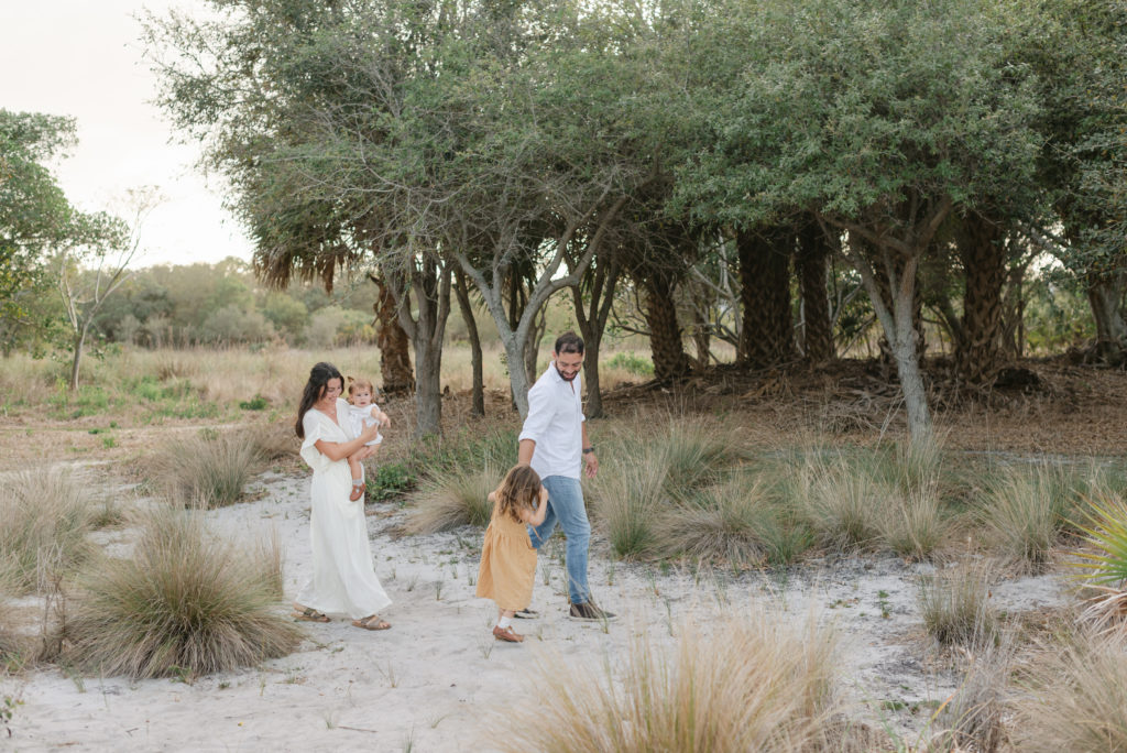 Family walking away holding hands