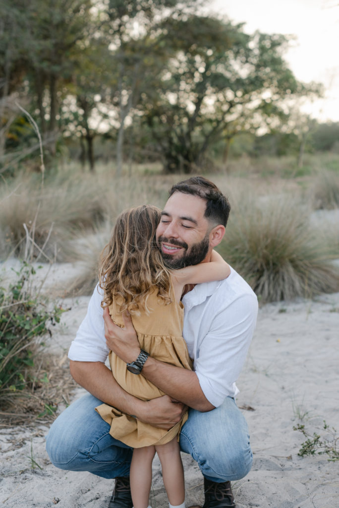 Daughter and dad hugging