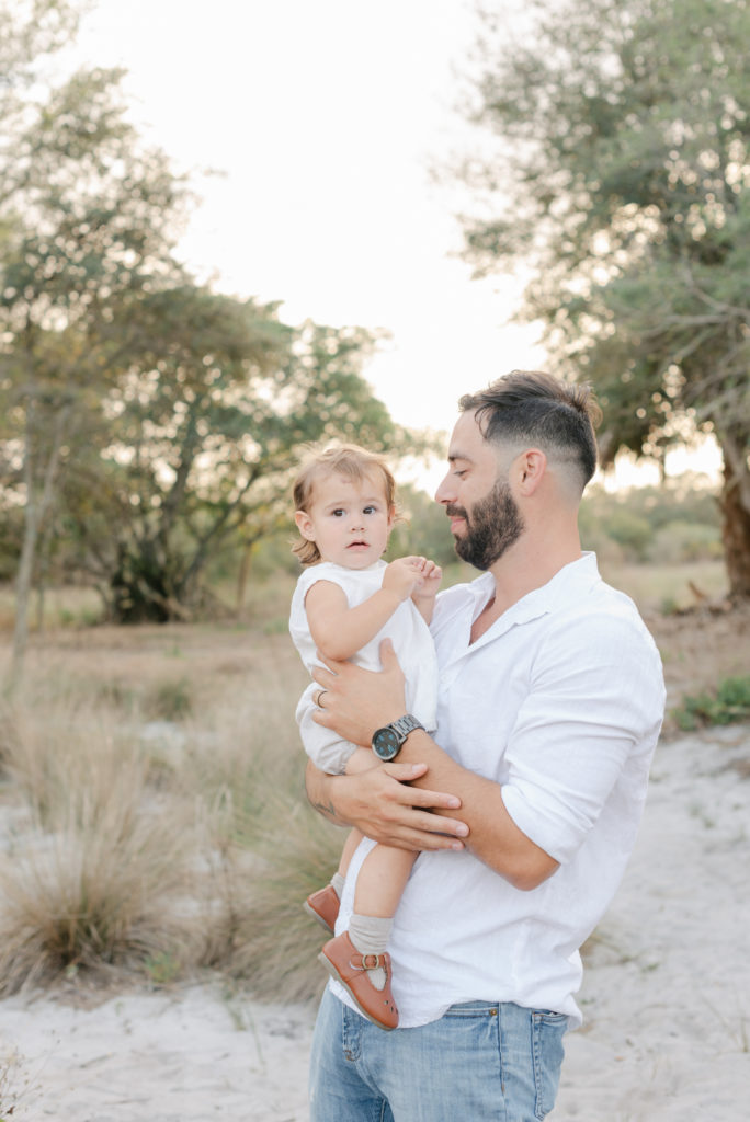 Dad looking at baby girl