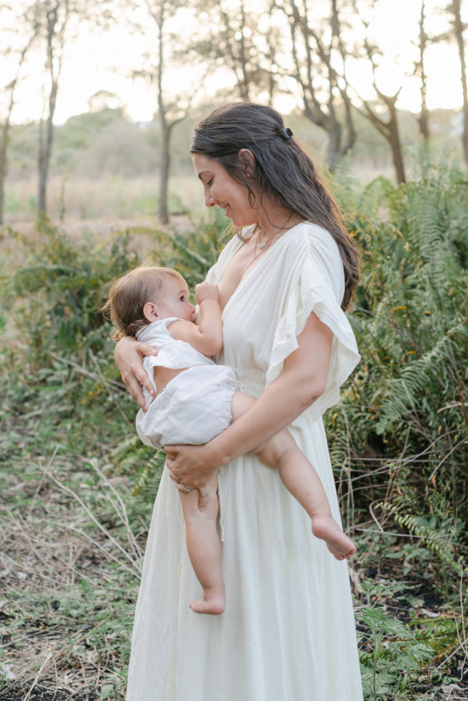 Mom nursing baby looking down at her