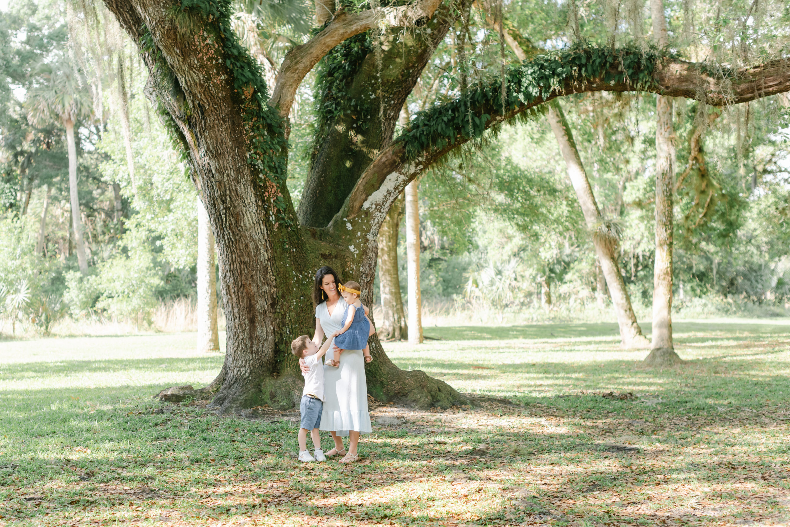 Mom looking at daughter in her arms