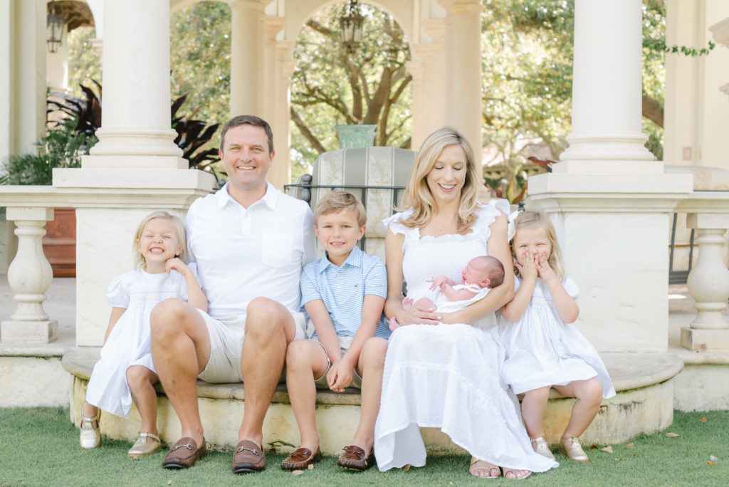 Family sitting on step