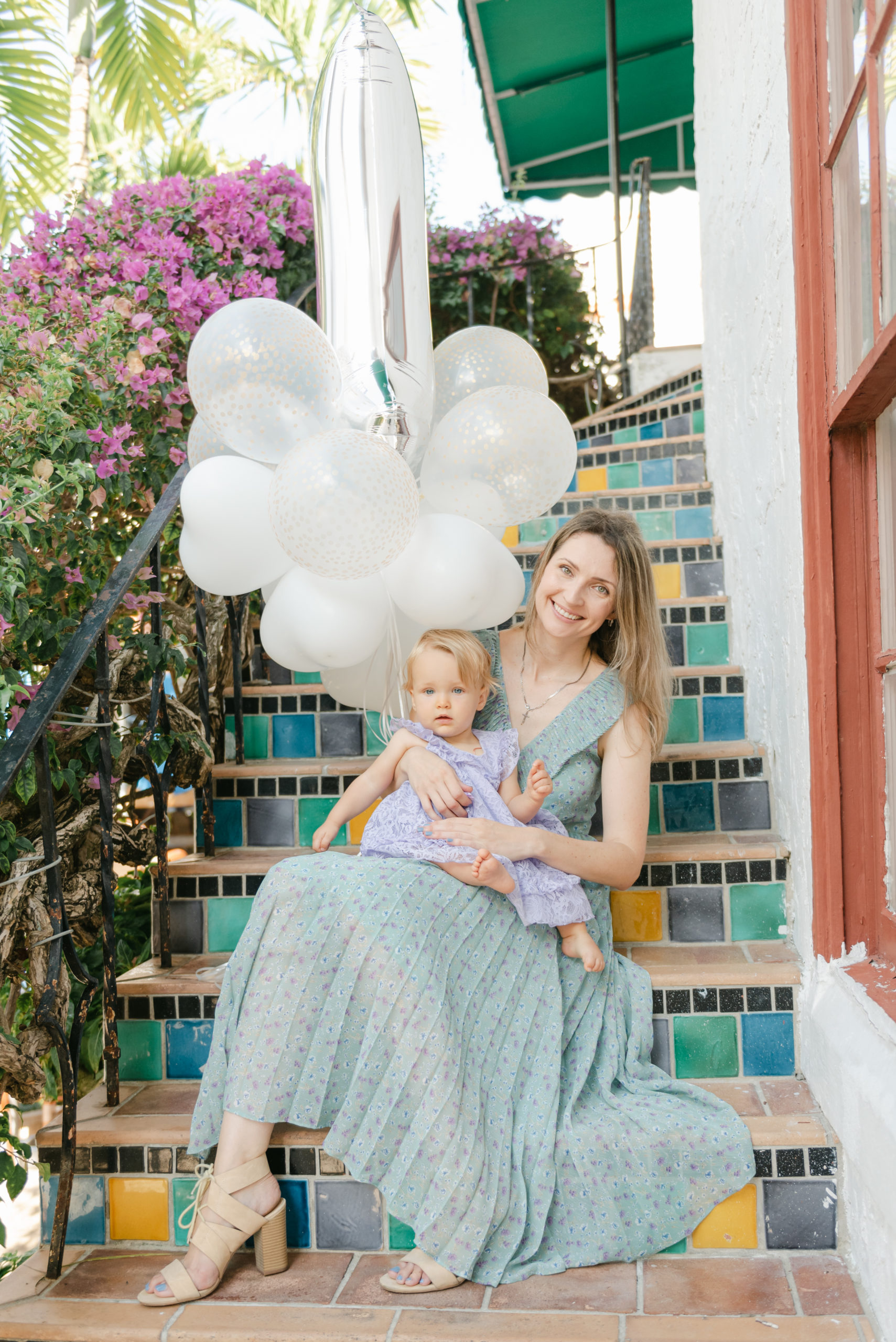 Mom and daughter with balloons