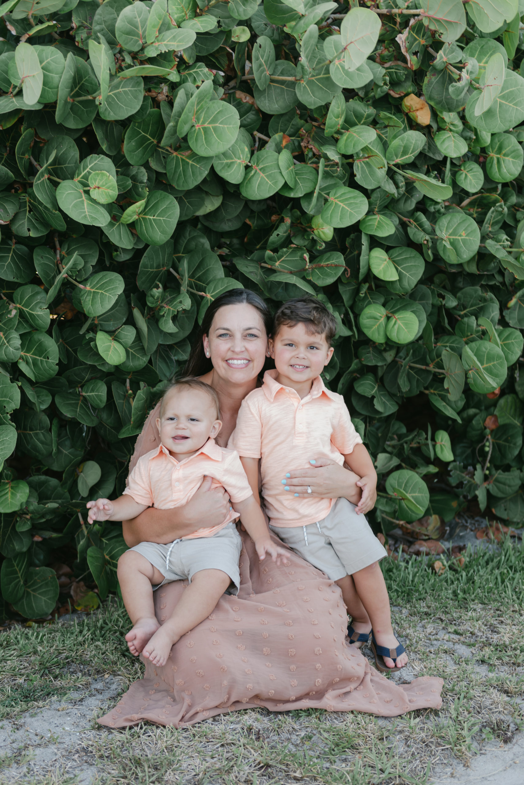 Mom and sons sitting