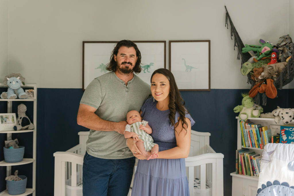 Mom and dad holding baby