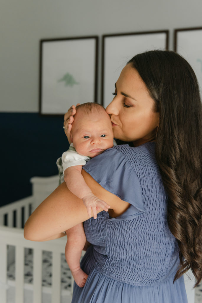 Mom kissing baby's head