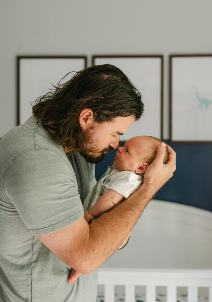 Dad and baby nose to nose