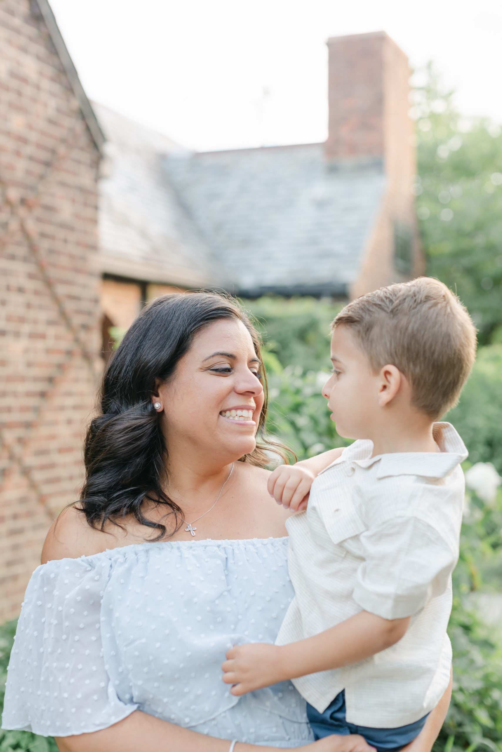 Mom and son looking at each other