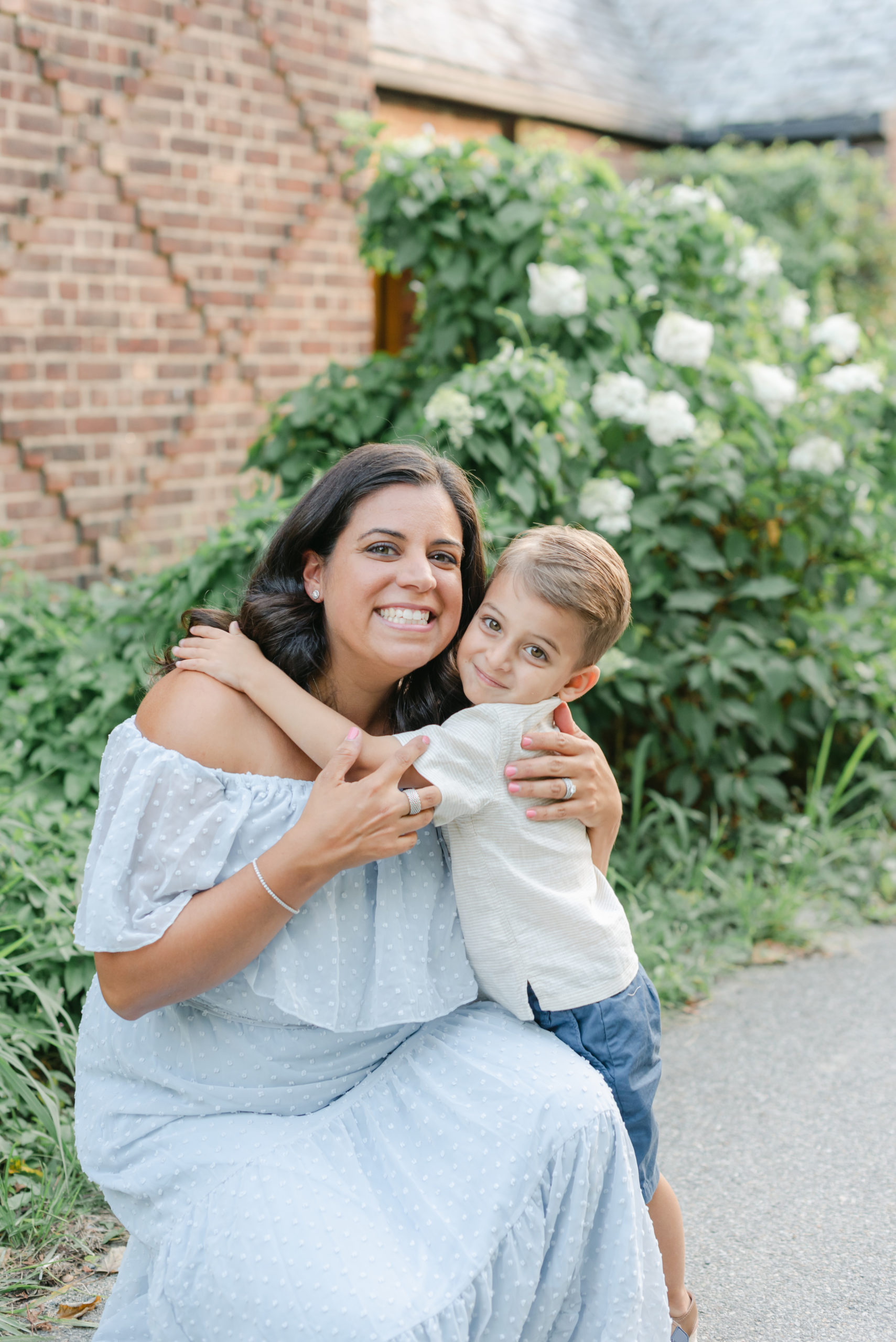 Mom and son hugging