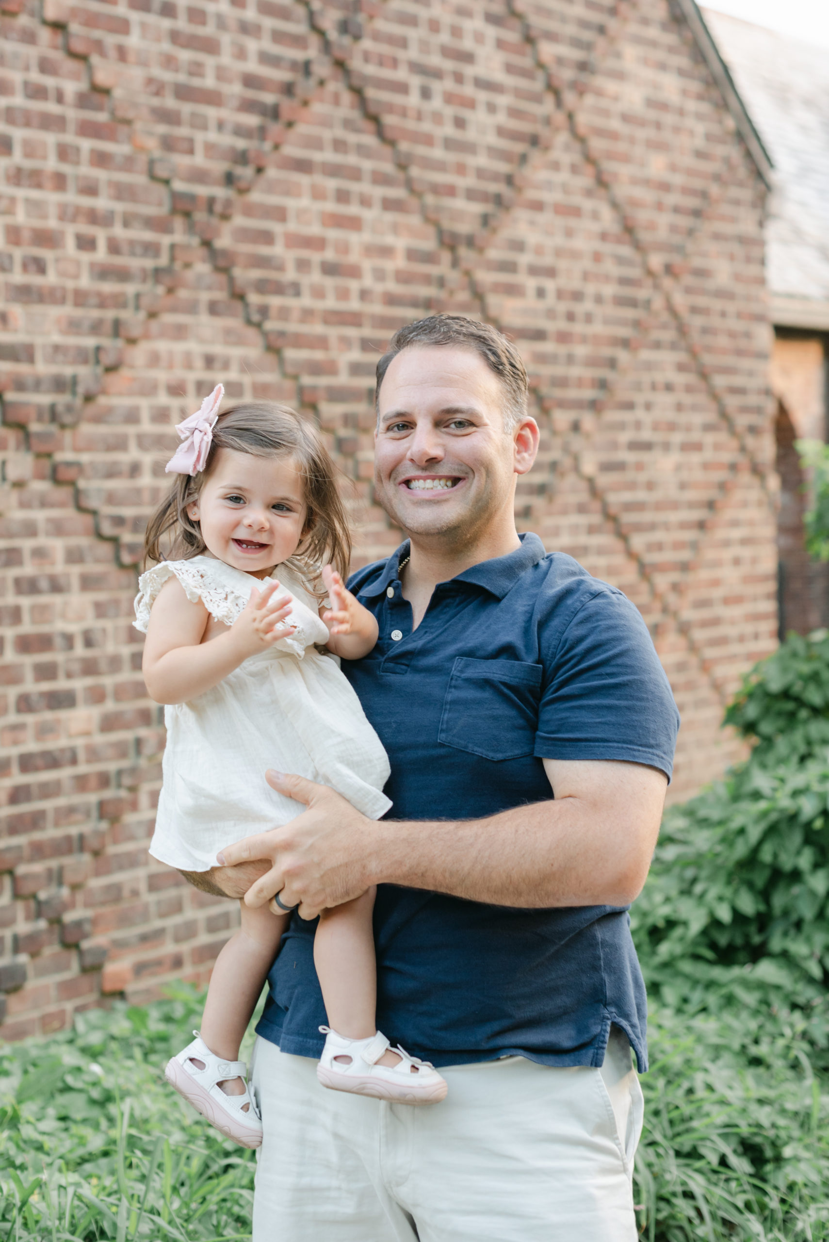 Dad holding baby girl