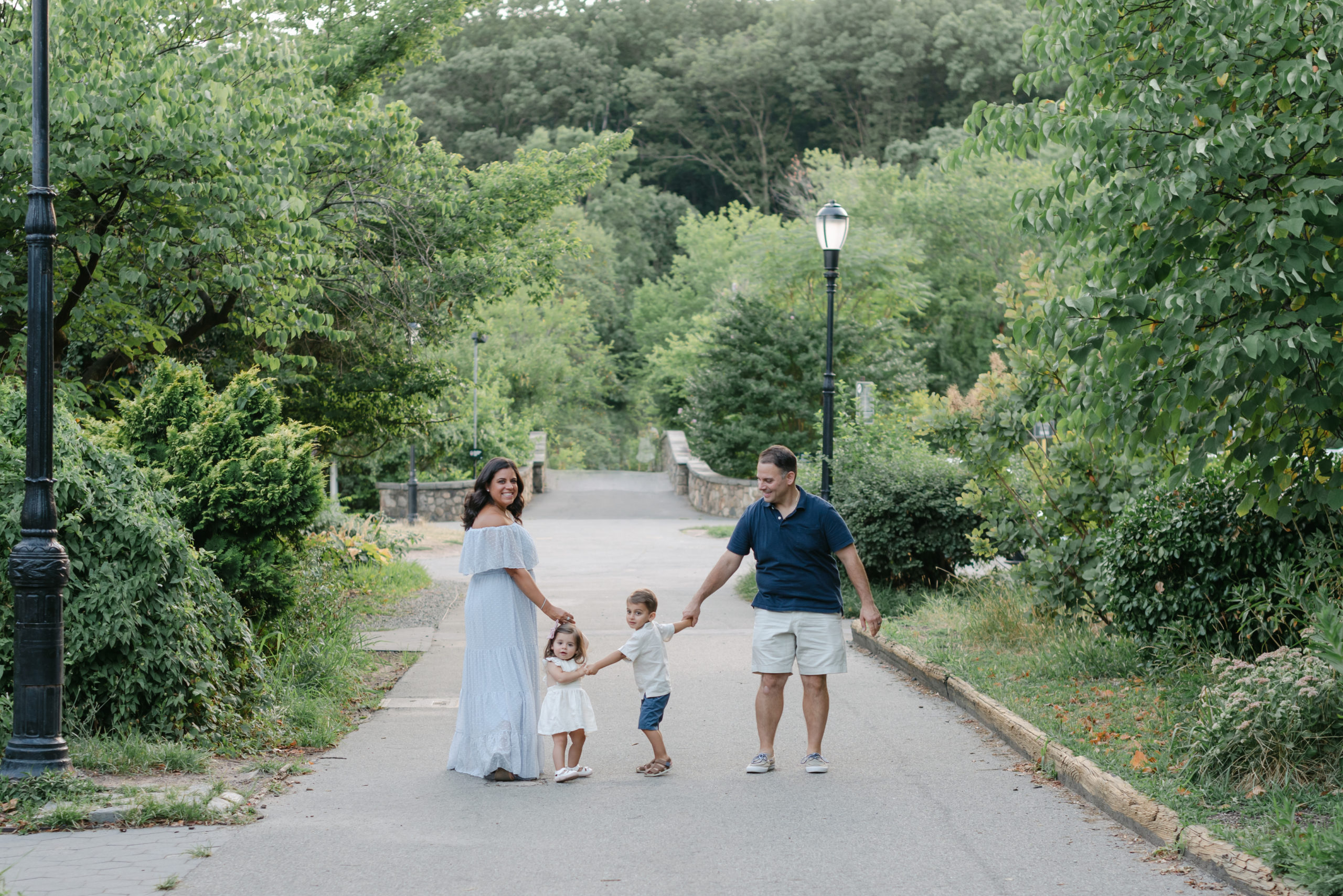 Family walking away, mom looking back