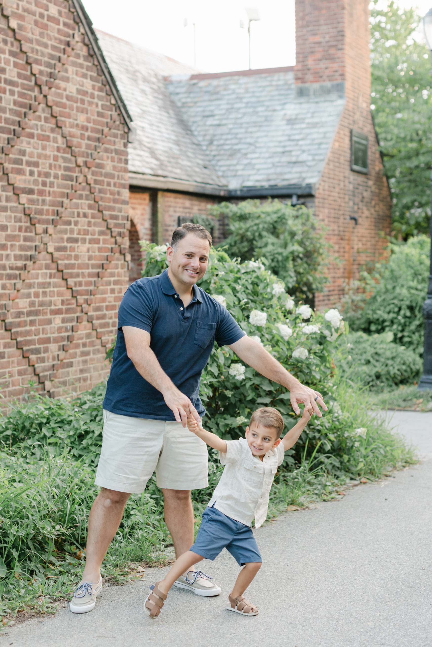 Dad and son playing