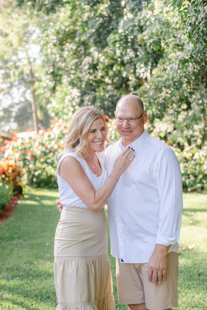 husband and wife laughing by Palm Beach family photographer